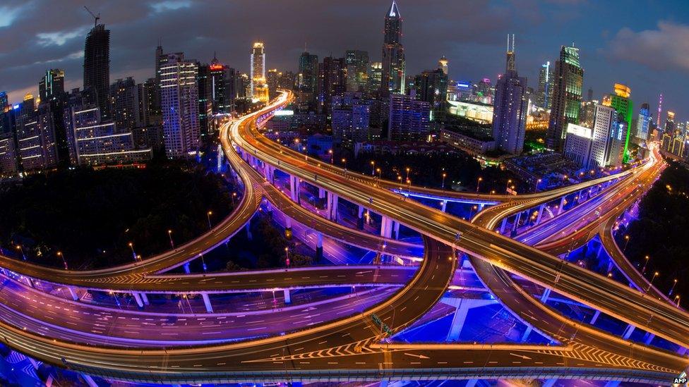 File photo: Roads and Shanghai's skyline, 30 September 2014