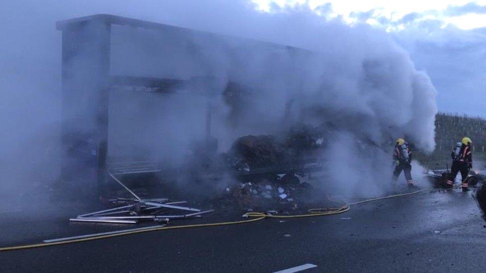 Lorry fire being tackled by firefighters on A14 at Brampton