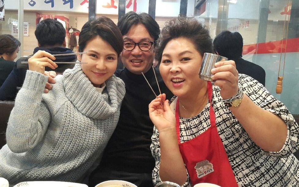 Cheol-woong with two other North Korean defectors at a dinner party in Seoul