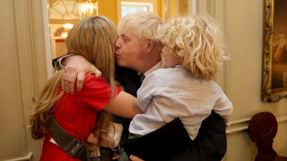 Boris Johnson kisses wife Carrie before making his resignation speech