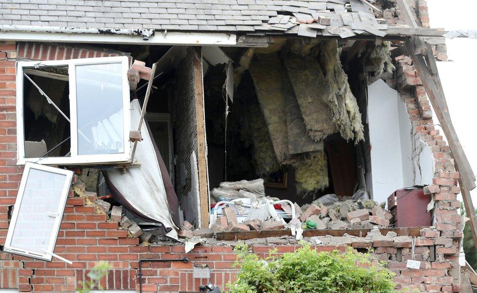 Close up of the damaged house