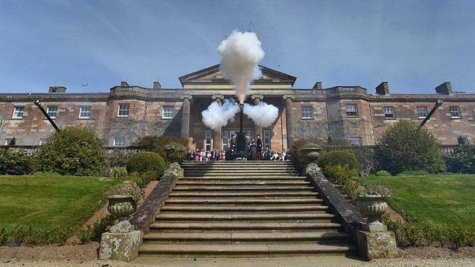 A 21-gun salute being fired at Hillsborough Castle near Belfast