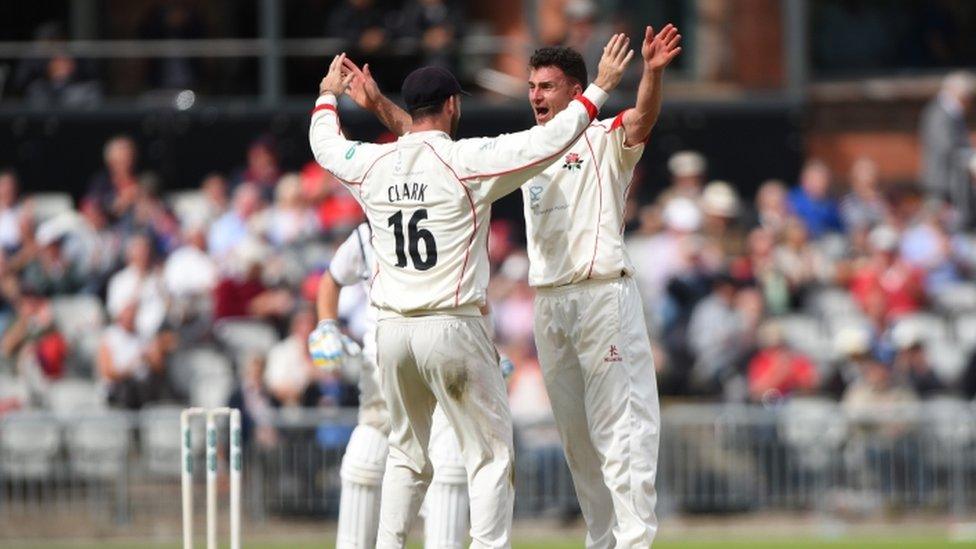 Lancashire's Ryan McLaren celebrates the dismissal of Warwickshire's Ian Bell