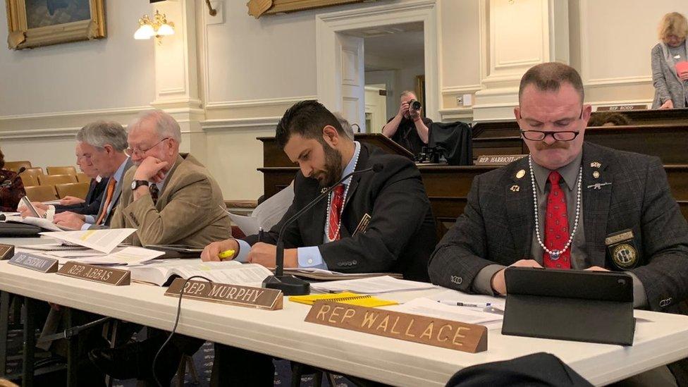 Republican representatives in New Hampshire wearing pearl necklaces