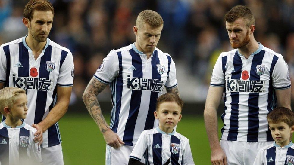 West Brom midfielder James McClean (C)