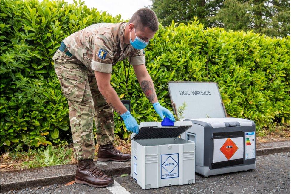 Soldier at mobile testing unit