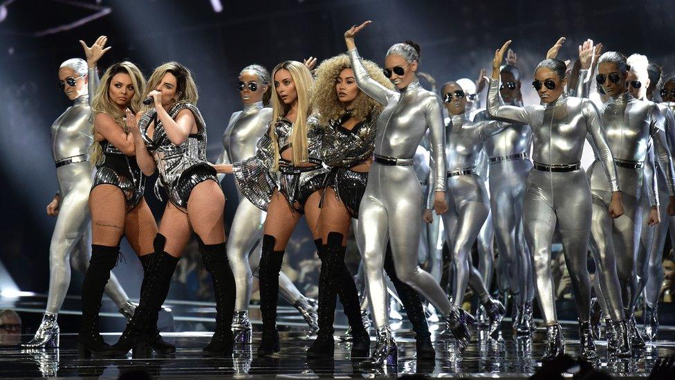 Little Mix on stage at the Brits