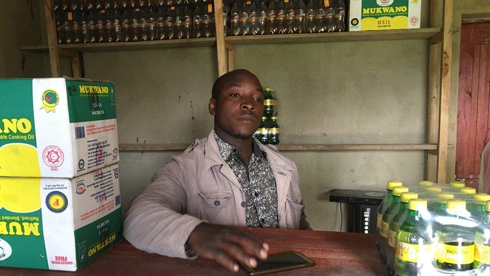 Bedia Nizeyimana in his shop