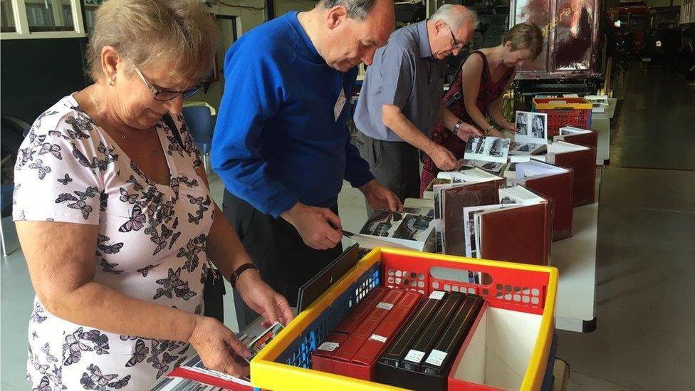 People looking through the collection after it had arrived today