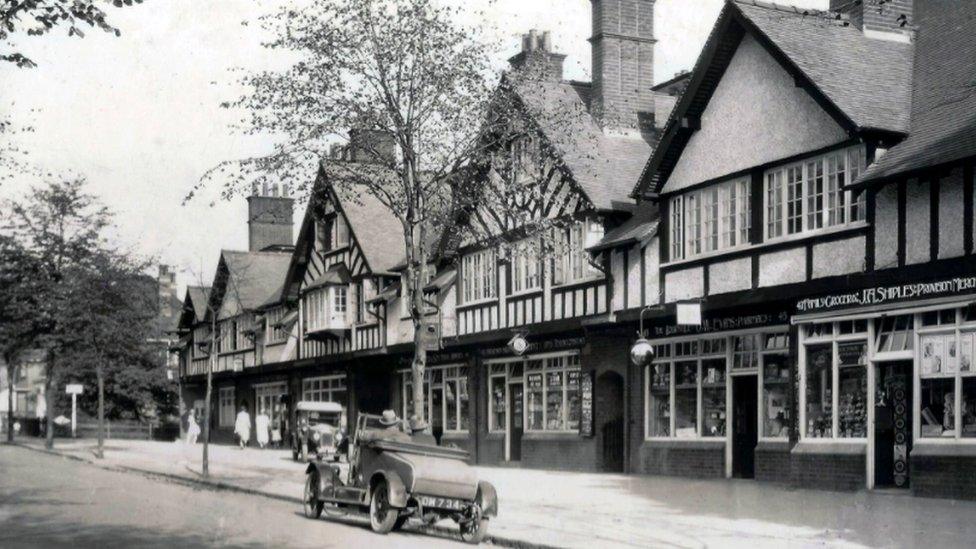 Shops at Bournville village green in 1925