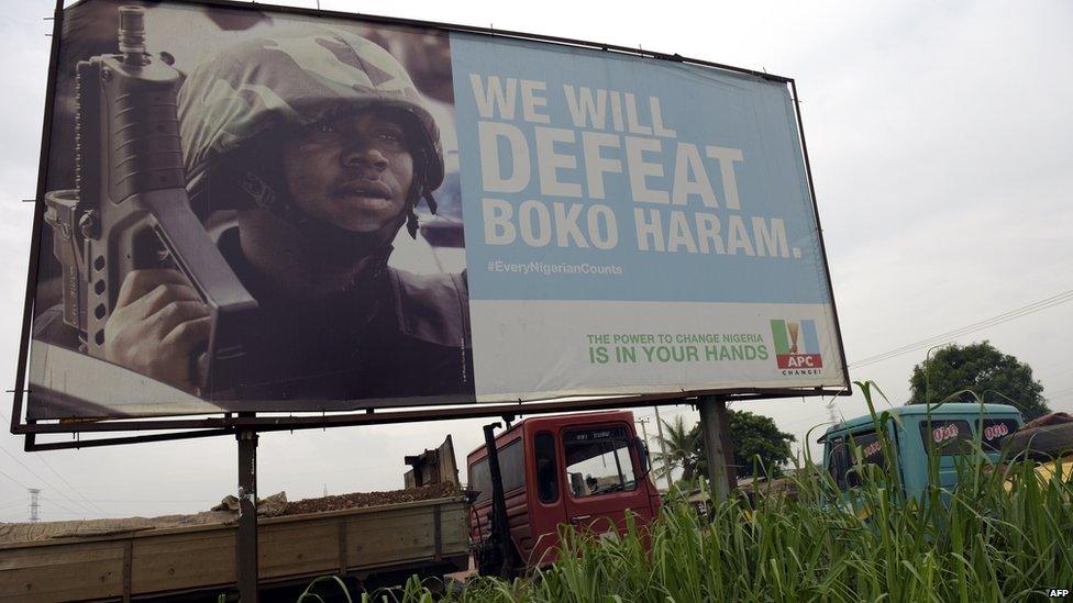 A campaign sign displayed by the ruling All Progressives Congress (APC) showing its readiness to defeat Boko Haram militants on assumption office - Ogun state, Nigeria 2015