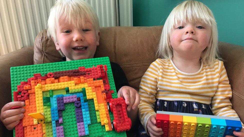 margo-and-barney-hold-up-lego-rainbow-creations