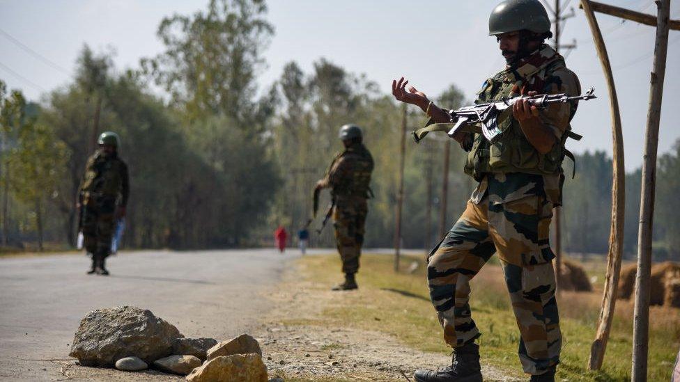 Indian army-men stand alert near gunfight site in Bejhbehara, South Kashmir some 60 kms from summer capital Srinagar.