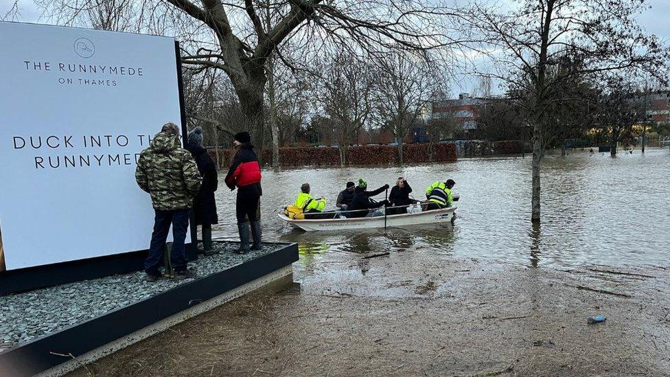 Runnymede Hotel staff in boat