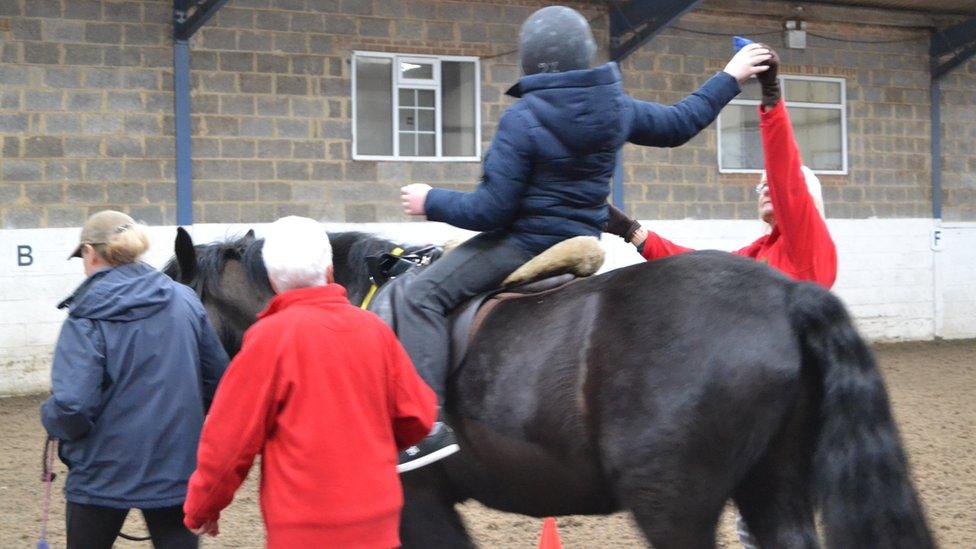 A child on a horse