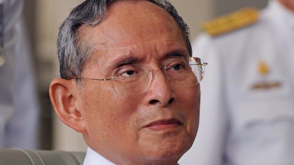 Thai King Bhumibol Adulyadej sits on wheelchair after the ceremony marking the 60th anniversary of his coronation in Bangkok on 5 May 2010