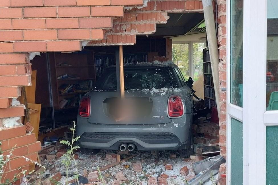 Car embedded in Sandiacre library