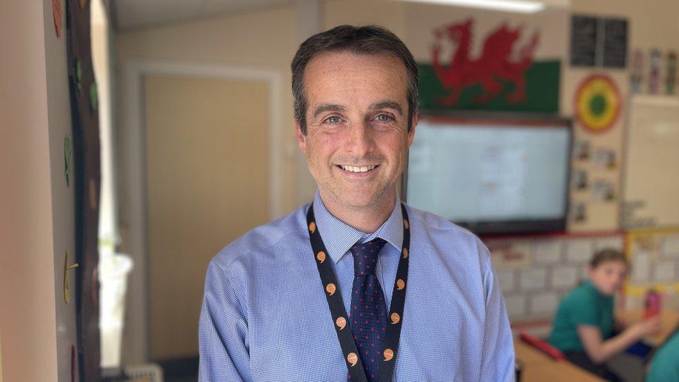 Plas Coch and Bro Alun head teacher Osian Jones in a classroom