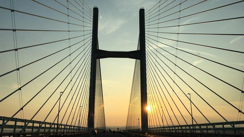 The sun peeking through the iconic Severn bridge, taken by Edd Thomas