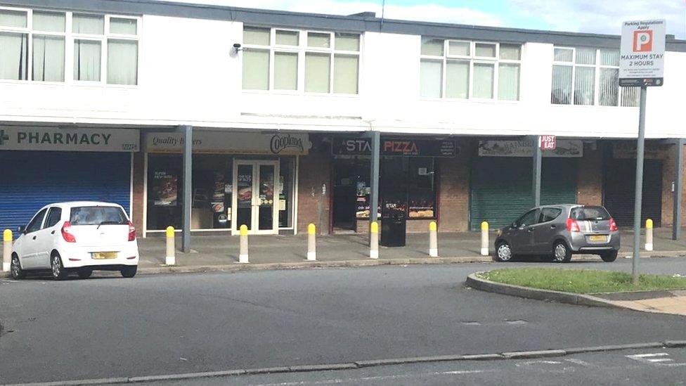 View of car park showing entrance and ANPR camera on the wall