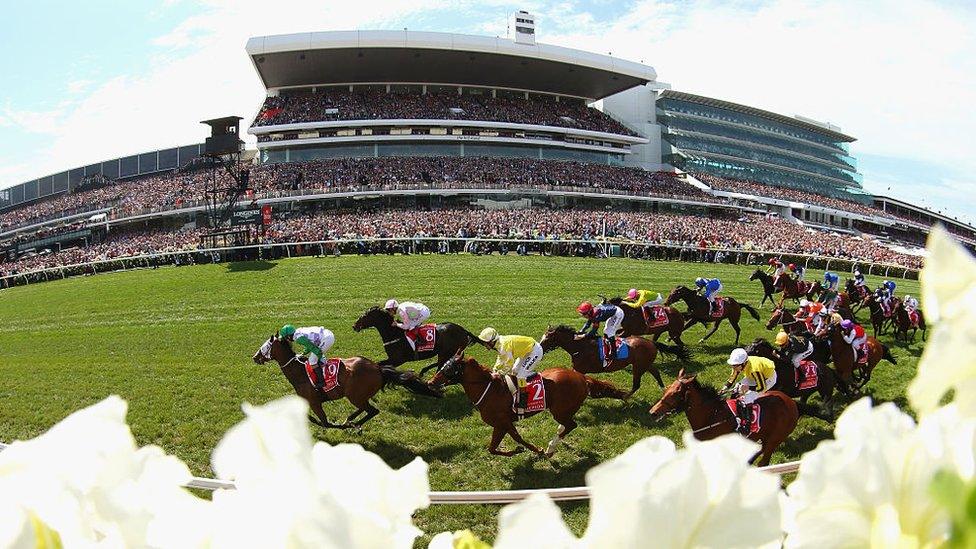 Thousands line the track a Flemington Racecourse for the world renowned Melbourne Cup