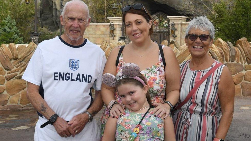 Popsie with her mum and grandparents