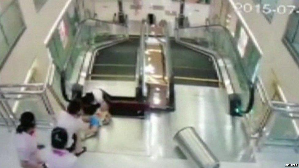 Surveillance video showing the woman and child on the escalator, provided by CCTV to Reuters, 26 July 2015