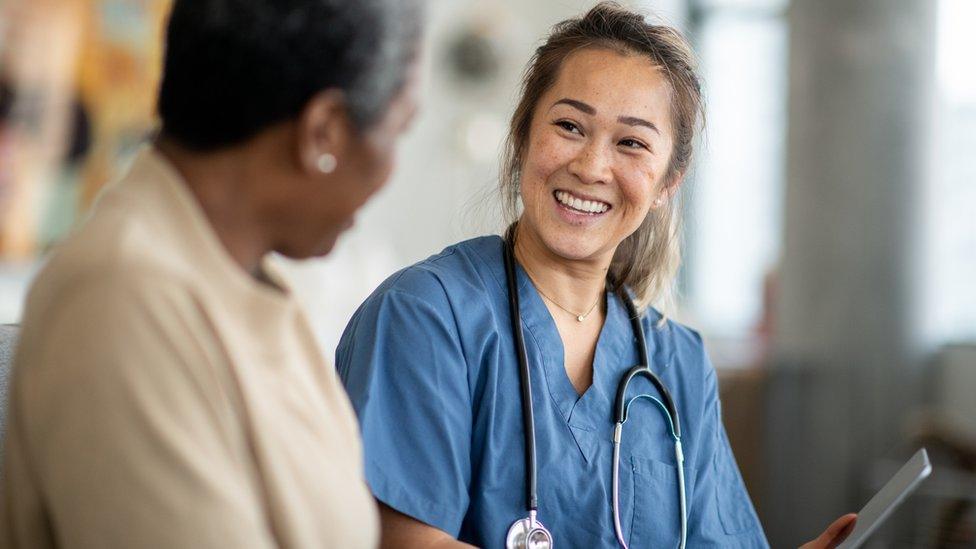 Nurse with woman