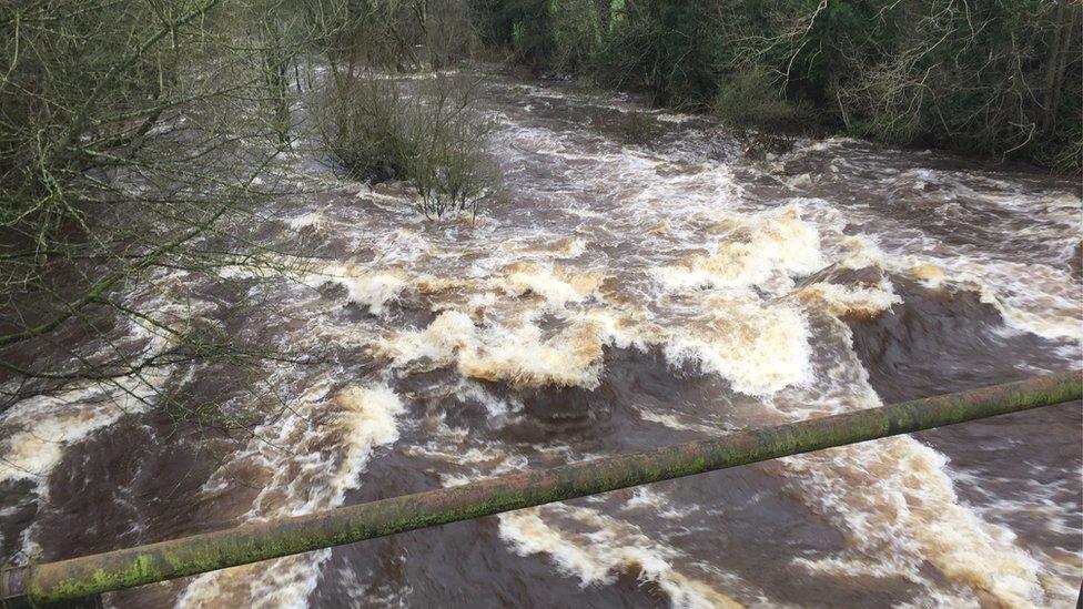 Fast-flowing water in Kellswater in County Antrim