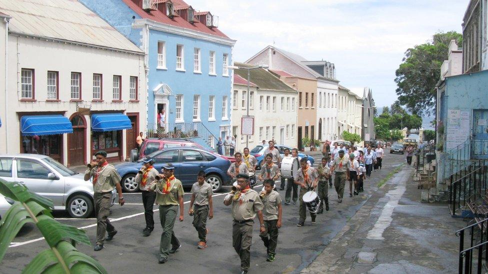 Band marches along main street in St Helena