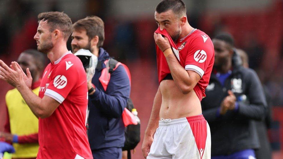 Players looking downhearted at end of match