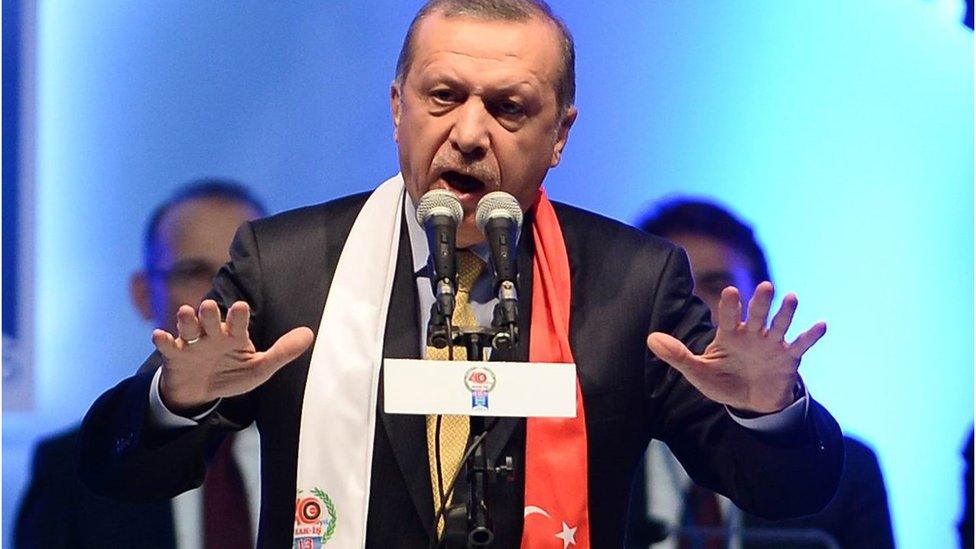 President Recep Tayyip Erdogan speaks during a union conference