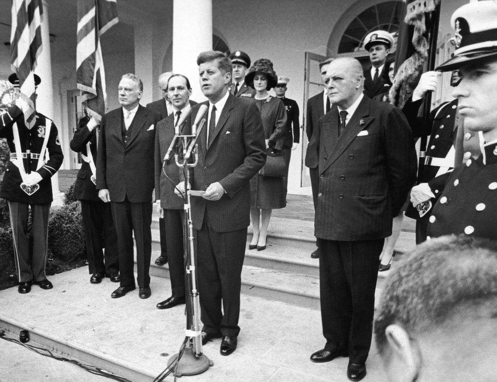 President Jack Kennedy (c) with then UK Ambassador Sir David Ormsby-Gore (l) and Randolph Churchill (r)