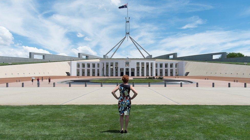 Pauline Hanson standing in front of Parliament House in Canberra