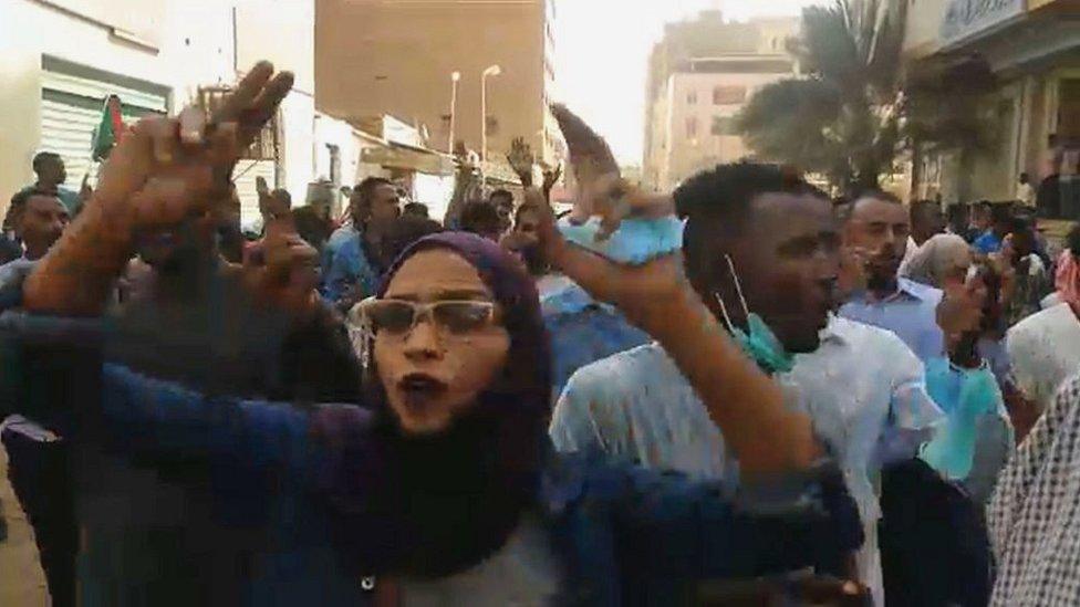 People chanting and shouting during a protest calling for the resignation of the Sudanese president in the capital Khartoum.