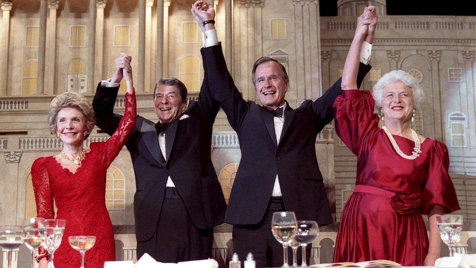 U.S. President Ronald Reagan (2nd L) and Vice President George Bush (2nd R), accompanied by their wives Nancy (L) and Barbara