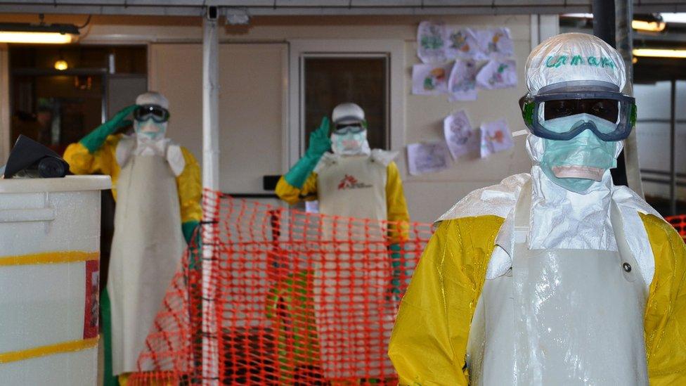 Health workers at the Nongo Ebola treatment centre in Conakry, Guinea, on 21 August 2015