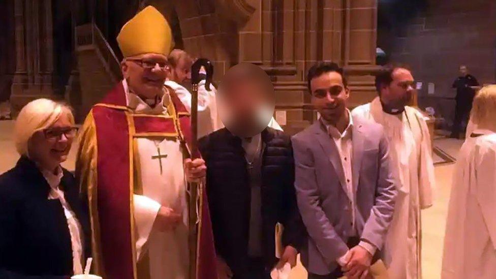 Emad al-Swealmeen aka Enzo Almeni (on right in light grey jacket), during a service at Liverpool's Anglican Cathedral, alongside Right Reverend Cyril Ashton Bishop Cyril Ashton today said he had conducted the confirmation of Emad Al Swealmeen in 2017. The 32-year-old was baptised in 2015 after converting to Christianity at Liverpool's Anglican Cathedral. source: Taken from Facebook account of Malcolm Hitchcott