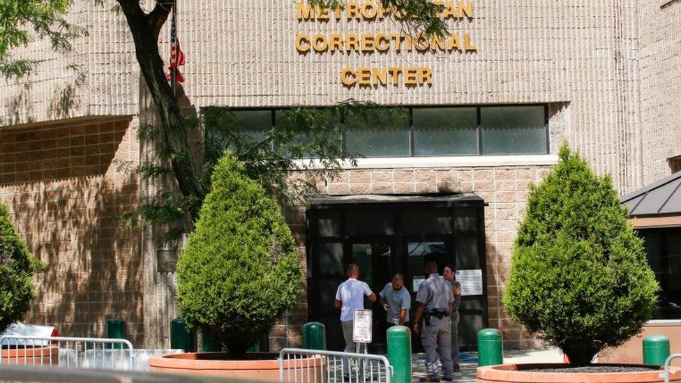 Workers outside the jail