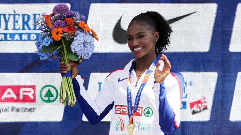 dina-asher-smith-holding-flowers.