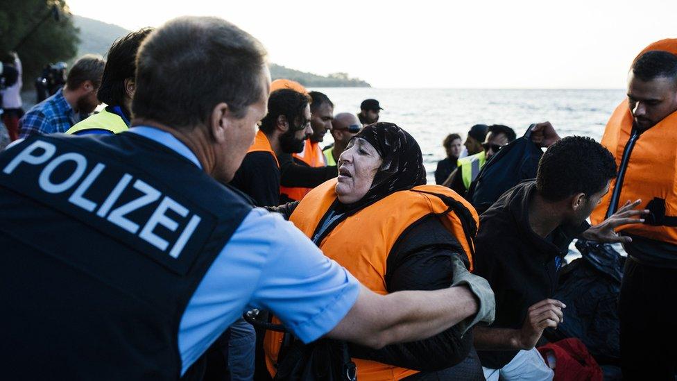 German police helping refugees in Lesbos, Greece, 17 Oct 15