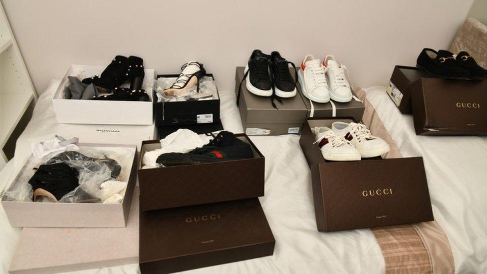 Boxes of designer trainers