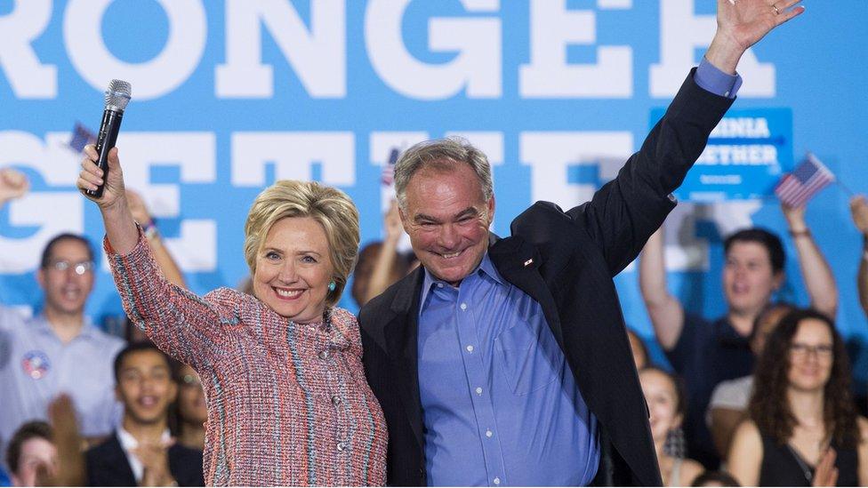 US Democratic presidential candidate Hillary Clinton (L) and Senator Tim Kaine campaign in Annandale, Virginia in July 2016