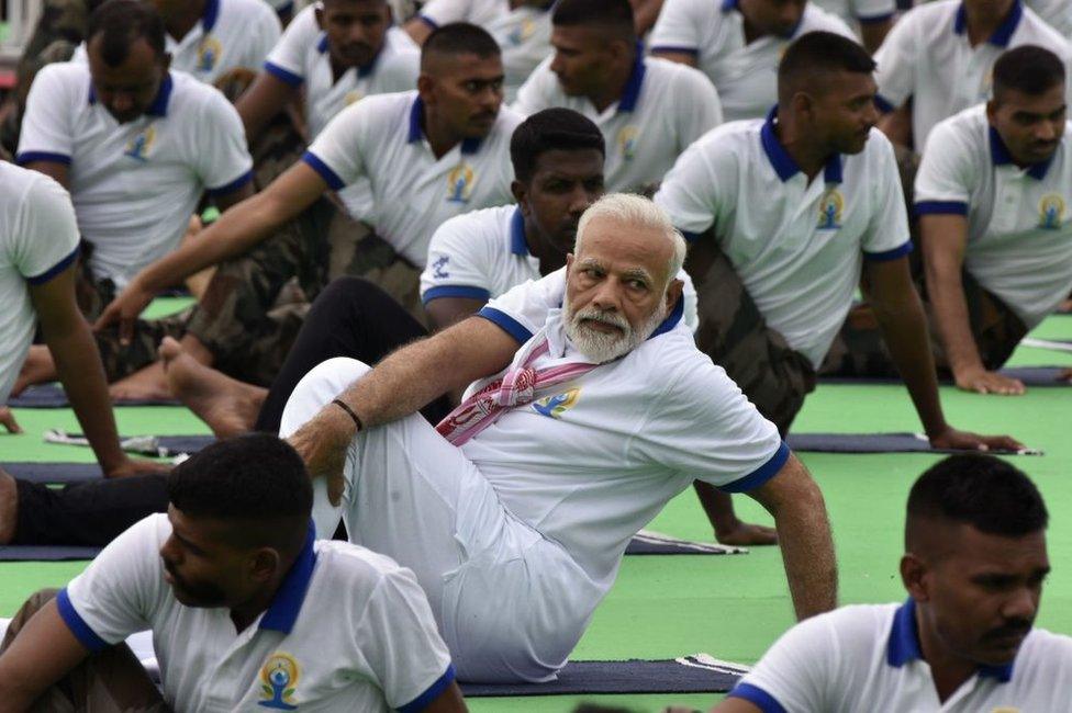 Indian Prime Minister Narendra Modi performs yoga during a mass yoga event on International Yoga Day in Ranchi in eastern Jharkhand state June 21, 2019.