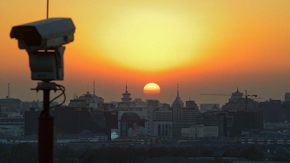 security camera and the beijing skyline