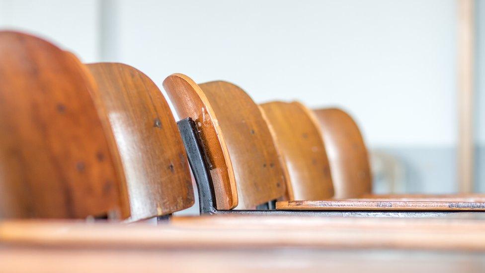 Empty school chairs