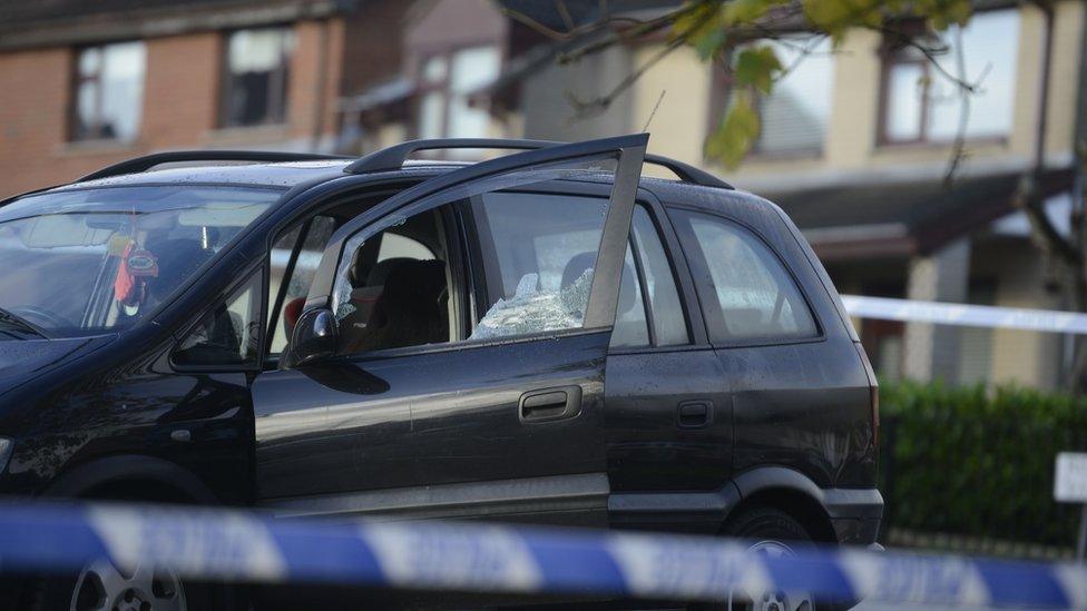 A picture of a car at the scene of the shooting