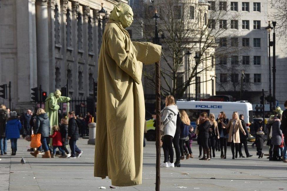 Floating Yoda street performer