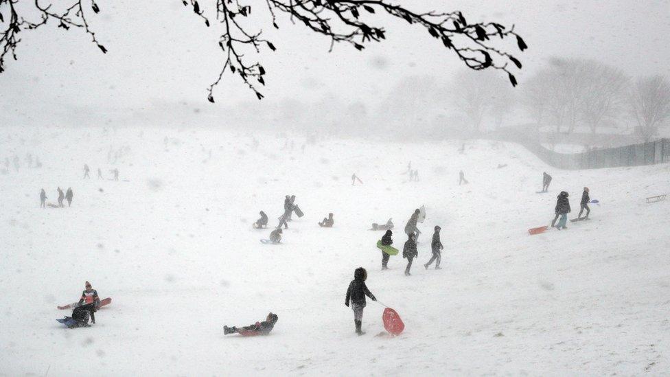 People enjoy sledging during blizzards in Whitley Bay, North Tyneside - 28 February 2018