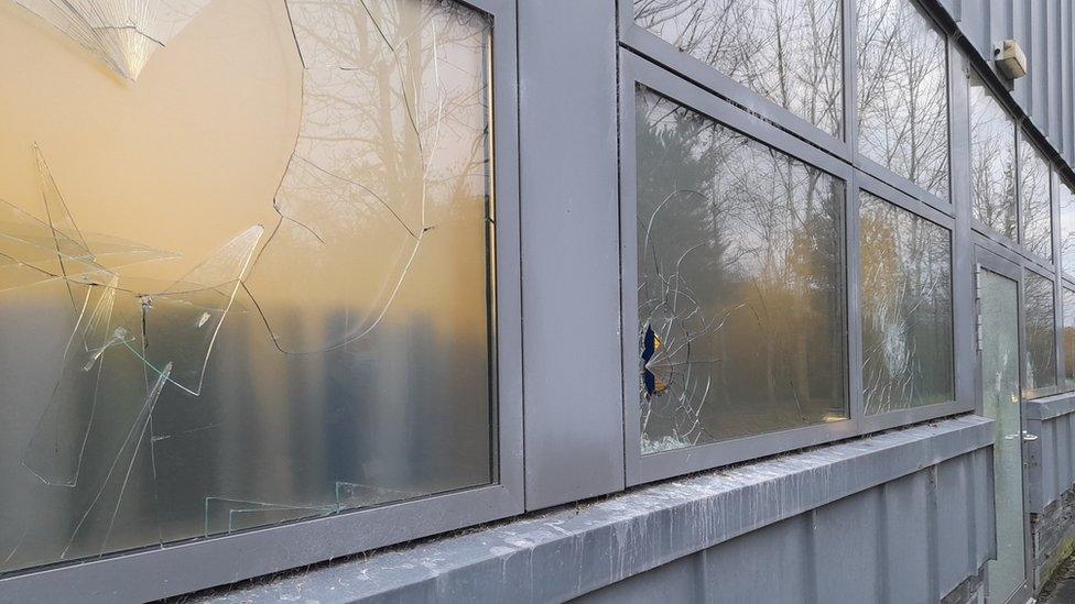 Smashed windows on the Optic Centre